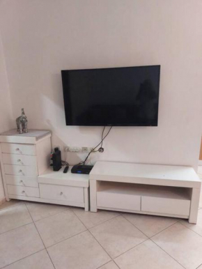 STAR 2 - two bedroom Apt. with a large yard & private pool